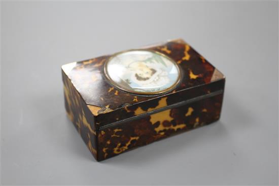 A late 19th century Swiss gold mounted tortoiseshell musical box, inset with a miniature of a young lady, width 8cm depth 5.5cm height